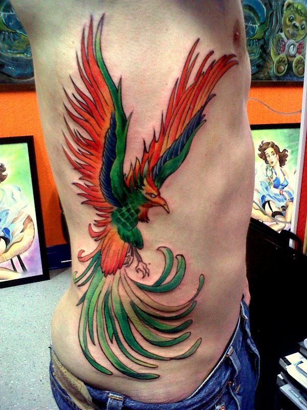 phoenix rib tattoo by nirpa on DeviantArt